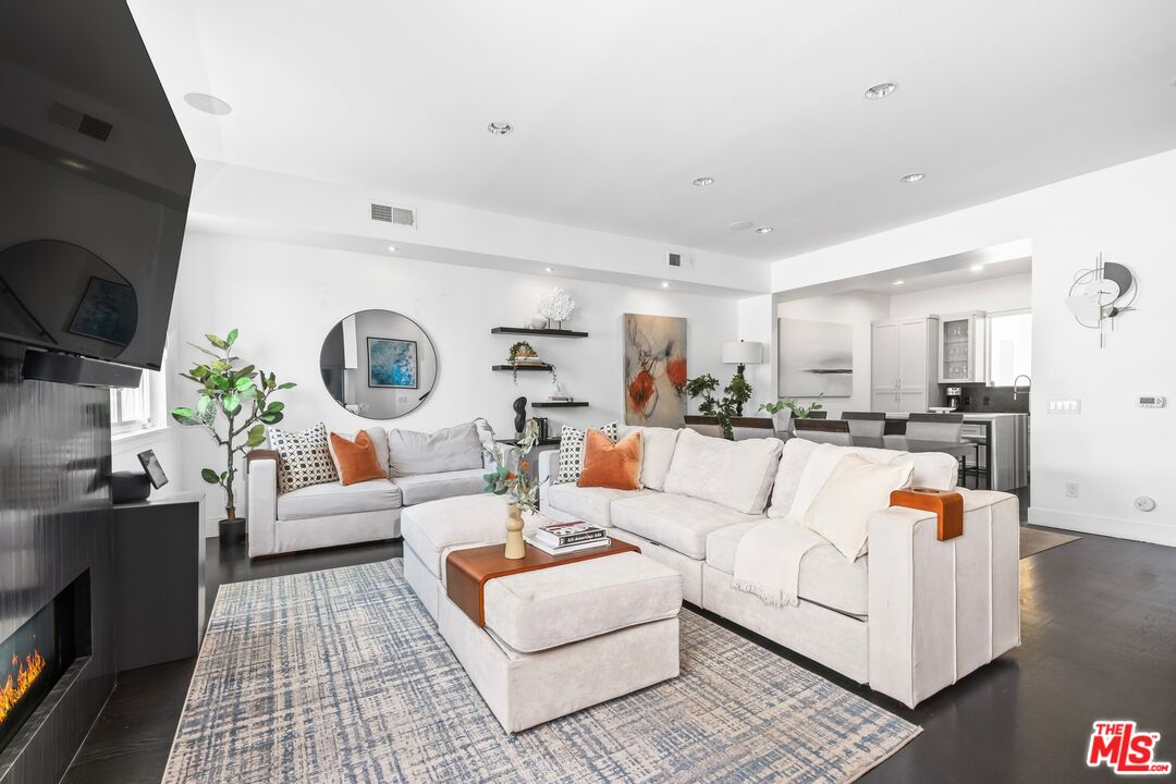 32 Galleon Street Marina del Rey, CA 90292 - Photo 1 of 24 a living room with furniture and a wooden floor