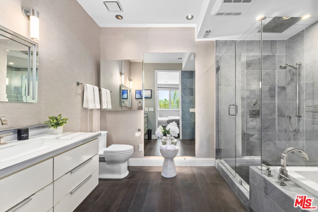 32 Galleon Street Marina del Rey, CA 90292 - Photo 12 of 24 a bathroom with a double vanity sink toilet and shower