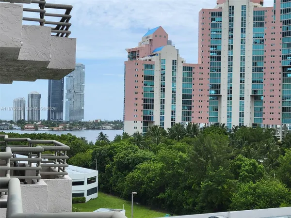 a view of a city with tall buildings