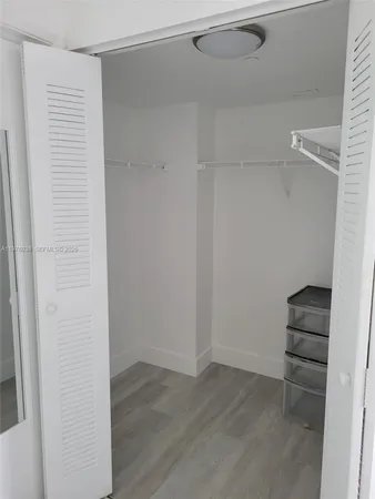 a view of small space with racks on the wall