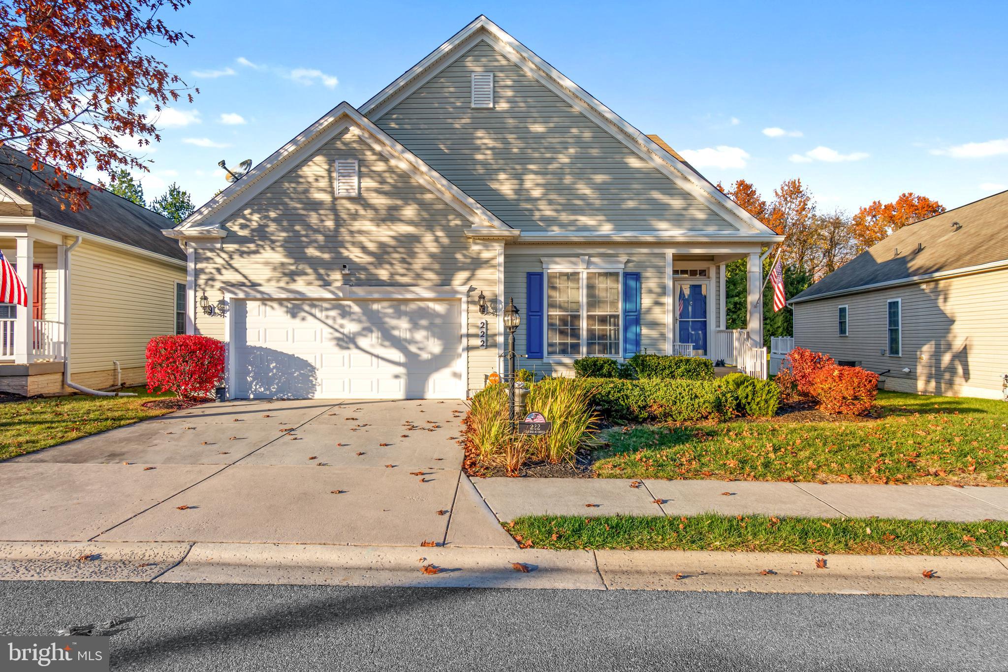 a front view of house with garage