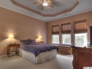 368 Sand Paver Way Fort Mill, SC 29708 - Photo 5 of 12 a spacious bedroom with a bed and a large window