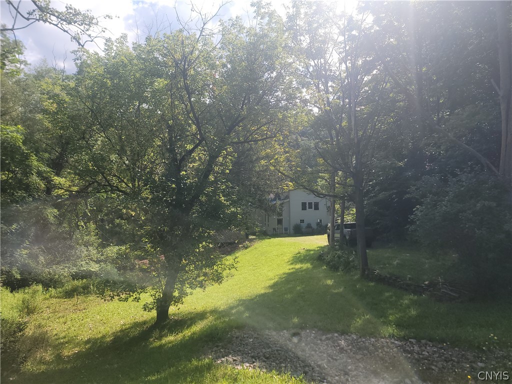 4906 Lawless Road Marcellus, NY 13108 - Photo 13 of 47 front from street, long setback