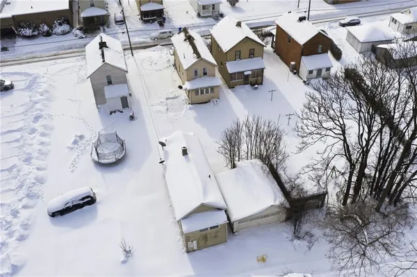 an aerial view of a city with lots of residential buildings
