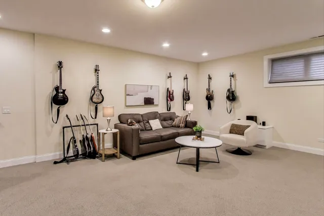 a living room with furniture and gym equipment