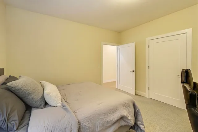 a bedroom with a bed and furniture