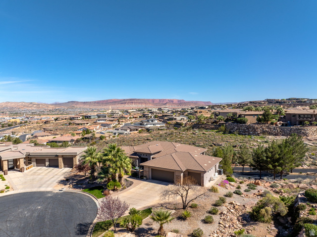2376 Stone Crest Circle St. George, UT 84790 - Photo 55 of 61 Aerial perspective of suburban area featuring a mountainous background