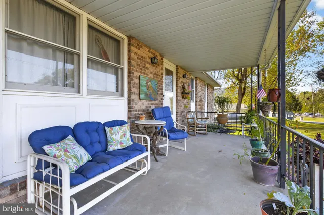 a outdoor living space with furniture and garden view
