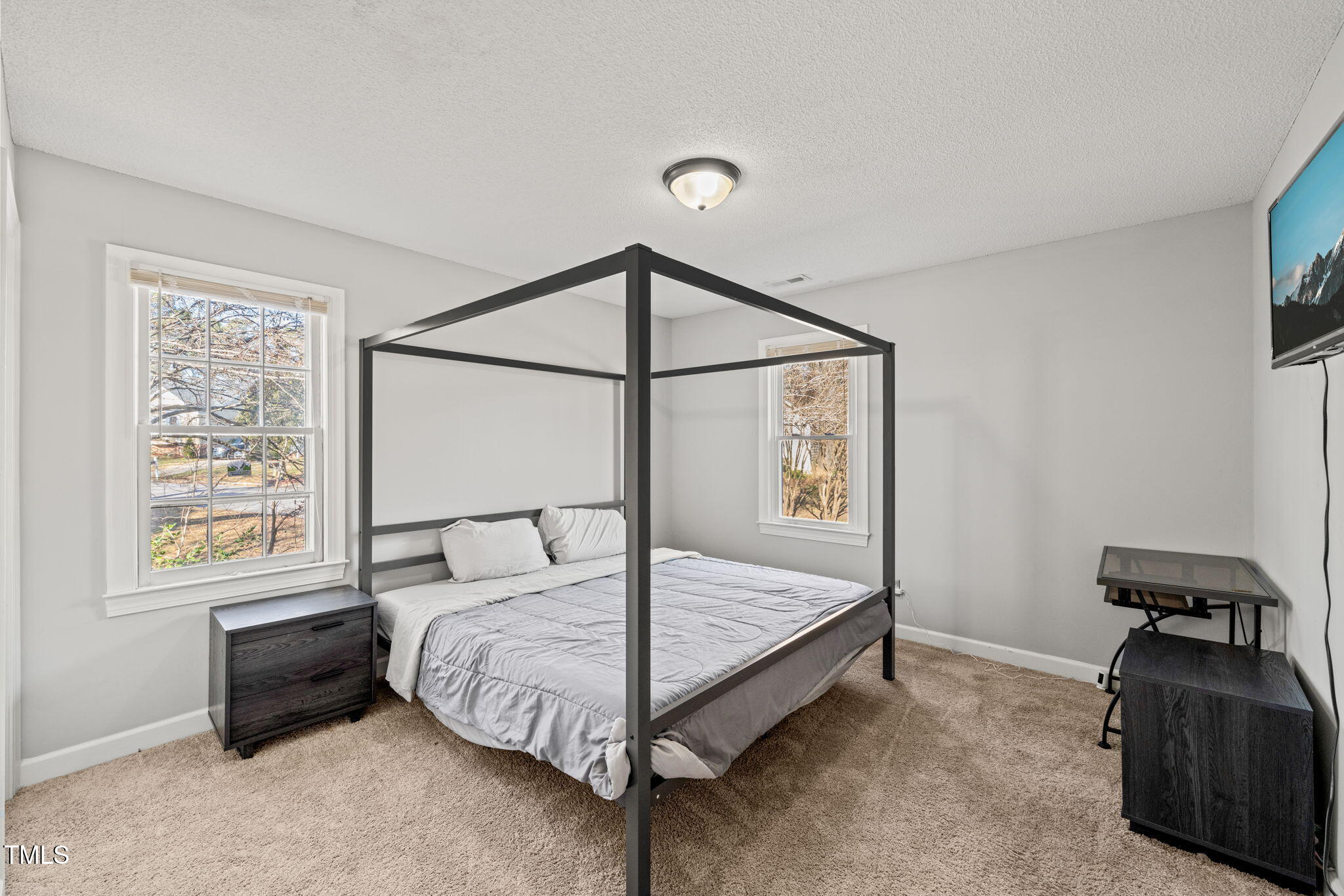 3701 East Jameson Road Raleigh, NC 27604 - Photo 17 of 26 a bedroom with a bed and a window