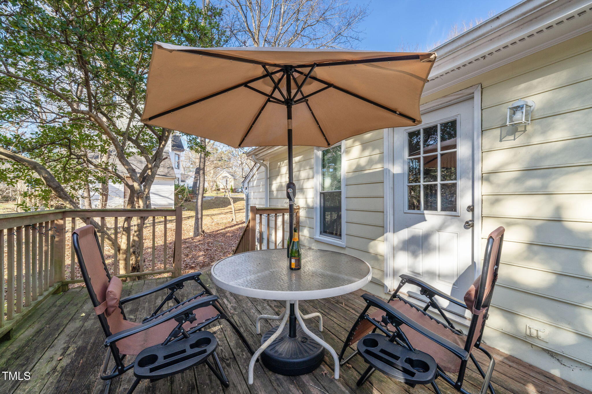 3701 East Jameson Road Raleigh, NC 27604 - Photo 21 of 26 a table and chairs in the patio