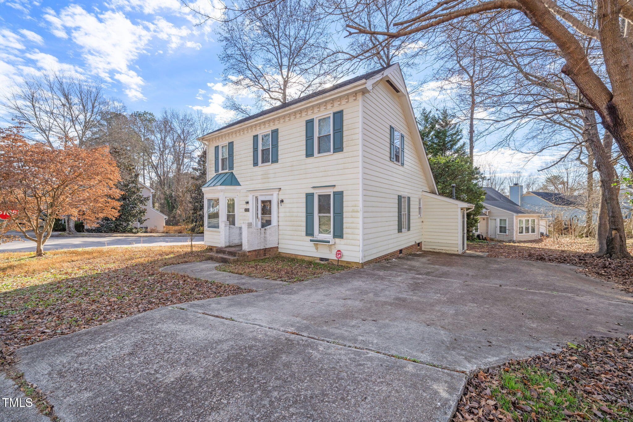 3701 East Jameson Road Raleigh, NC 27604 - Photo 25 of 26 a view of a house with a yard covered in snow