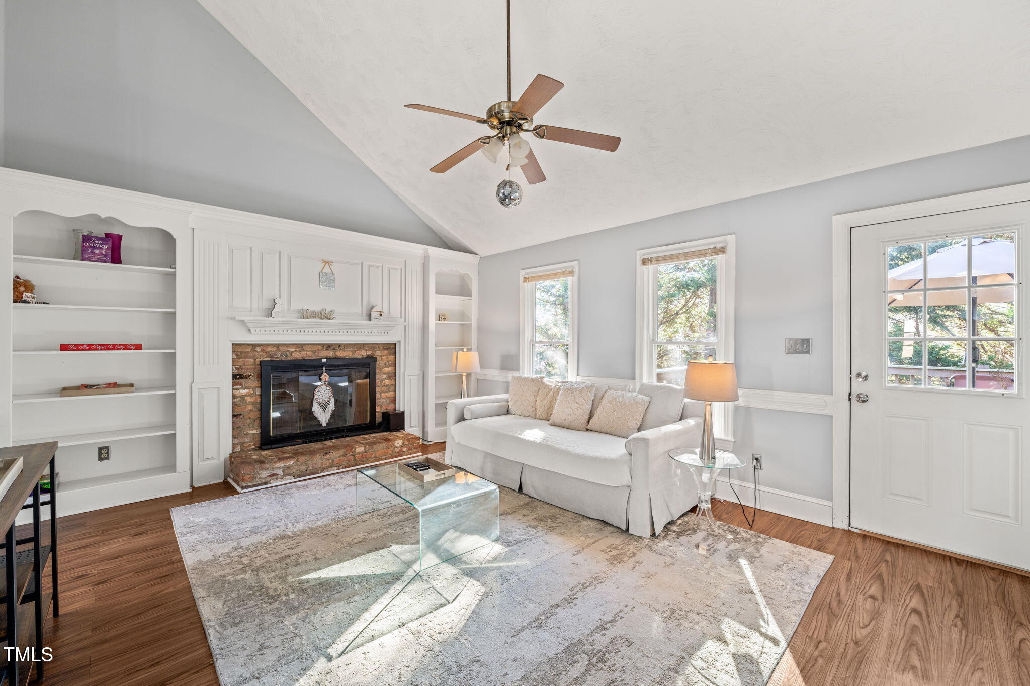 3701 East Jameson Road Raleigh, NC 27604 - Photo 4 of 26 a living room with furniture and a fireplace