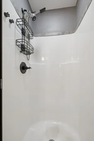 a close view of a shower in the bathroom