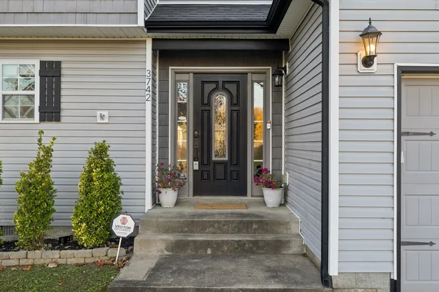 a view of a entryway door front of house
