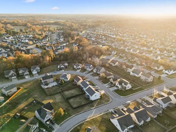 an aerial view of residential building with parking space