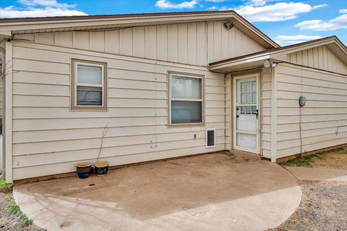 4802 54th Street Lubbock, TX 79414 - Photo 23 of 27 a view of a house with a backyard