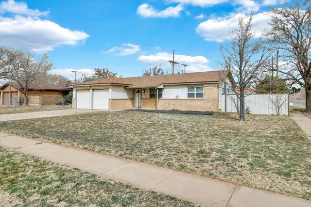 a view of a house with a snow
