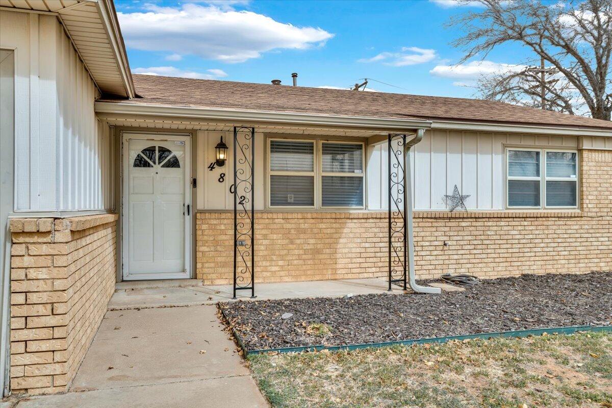 4802 54th Street Lubbock, TX 79414 - Photo 4 of 27 a view of a house with a door