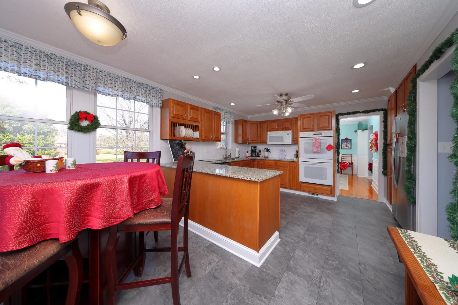 167 Henkel Road Waynesboro, VA 22980 - Photo 17 of 53 a dining hall with stainless steel appliances kitchen island granite countertop furniture and a living room