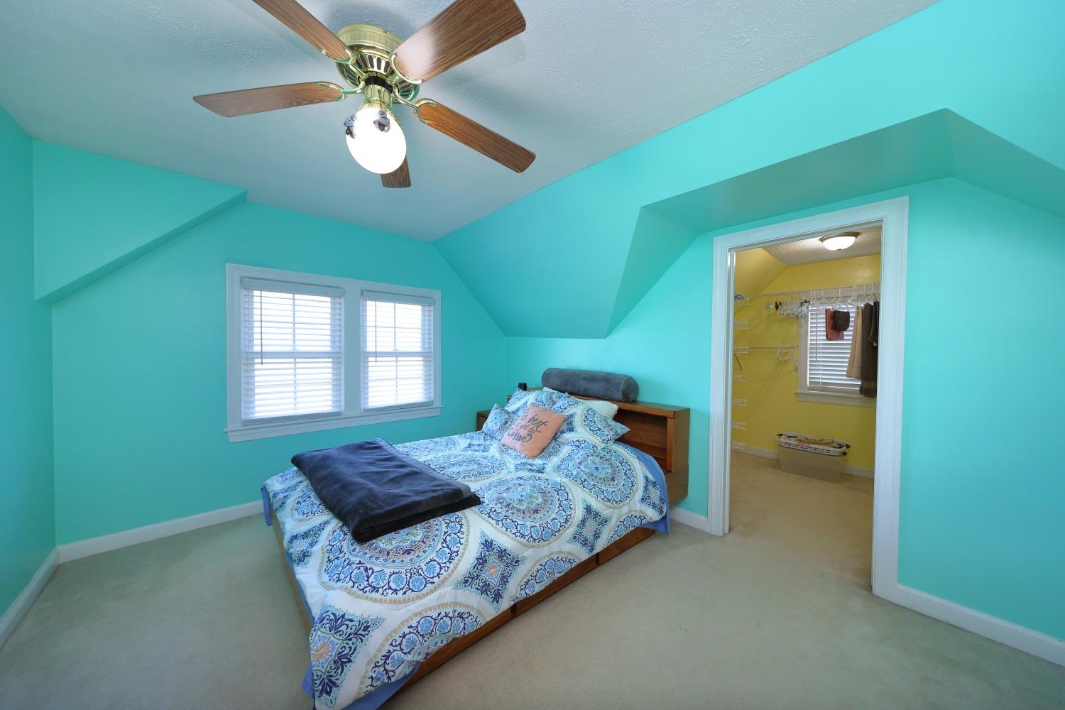 167 Henkel Road Waynesboro, VA 22980 - Photo 34 of 53 a bedroom with a bed and a chandelier