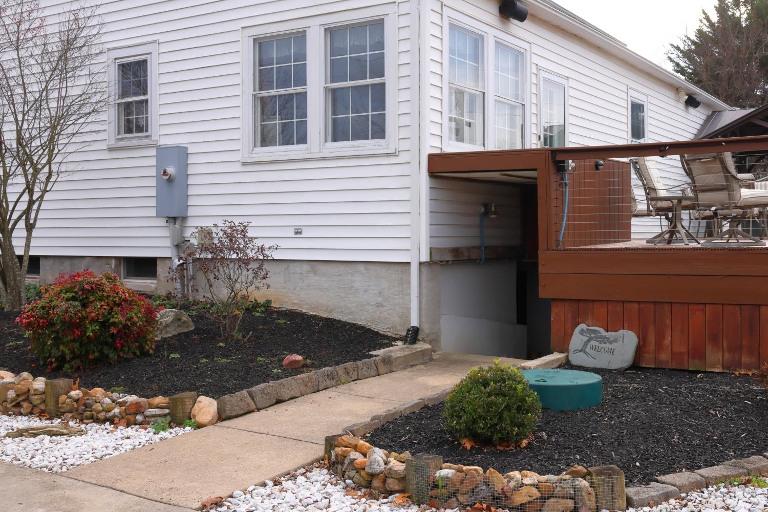 167 Henkel Road Waynesboro, VA 22980 - Photo 45 of 53 a backyard of a house with wooden fence and a potted plant