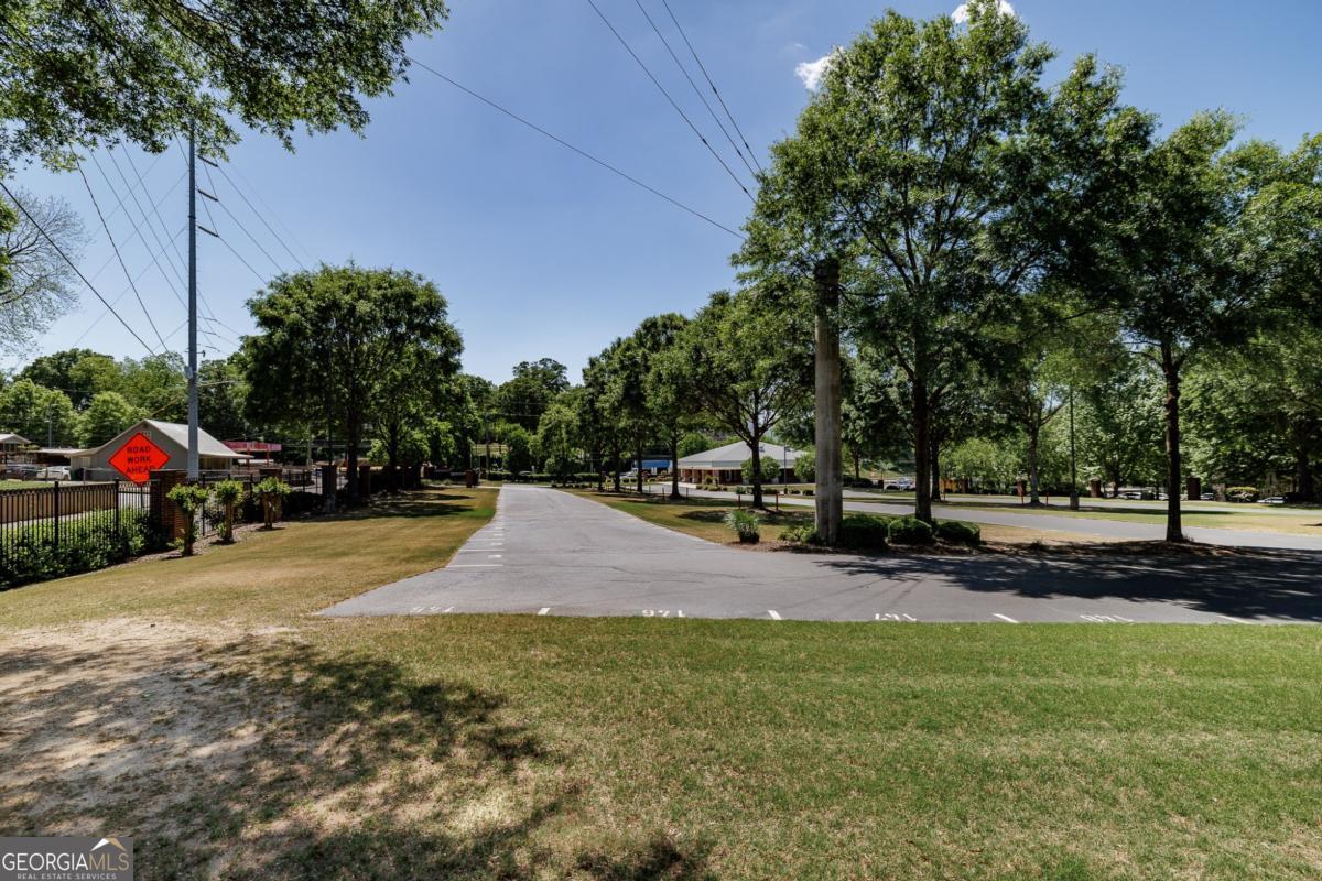 225 Oak Street, Unit 146 Athens, GA 30601 - Photo 19 of 23 a view of a street with houses and trees