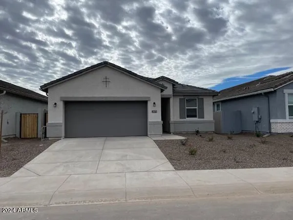 a house with yard in front of it