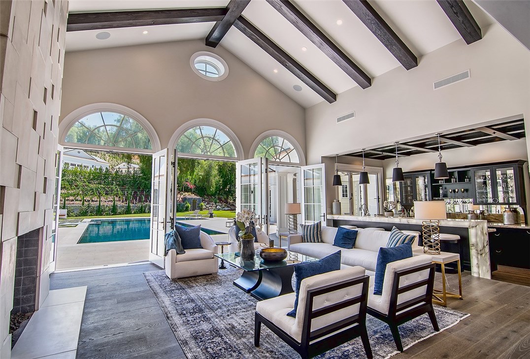 5546 Jed Smith Road Hidden Hills, CA 91302 - Photo 11 of 73 a living room with furniture and a large window