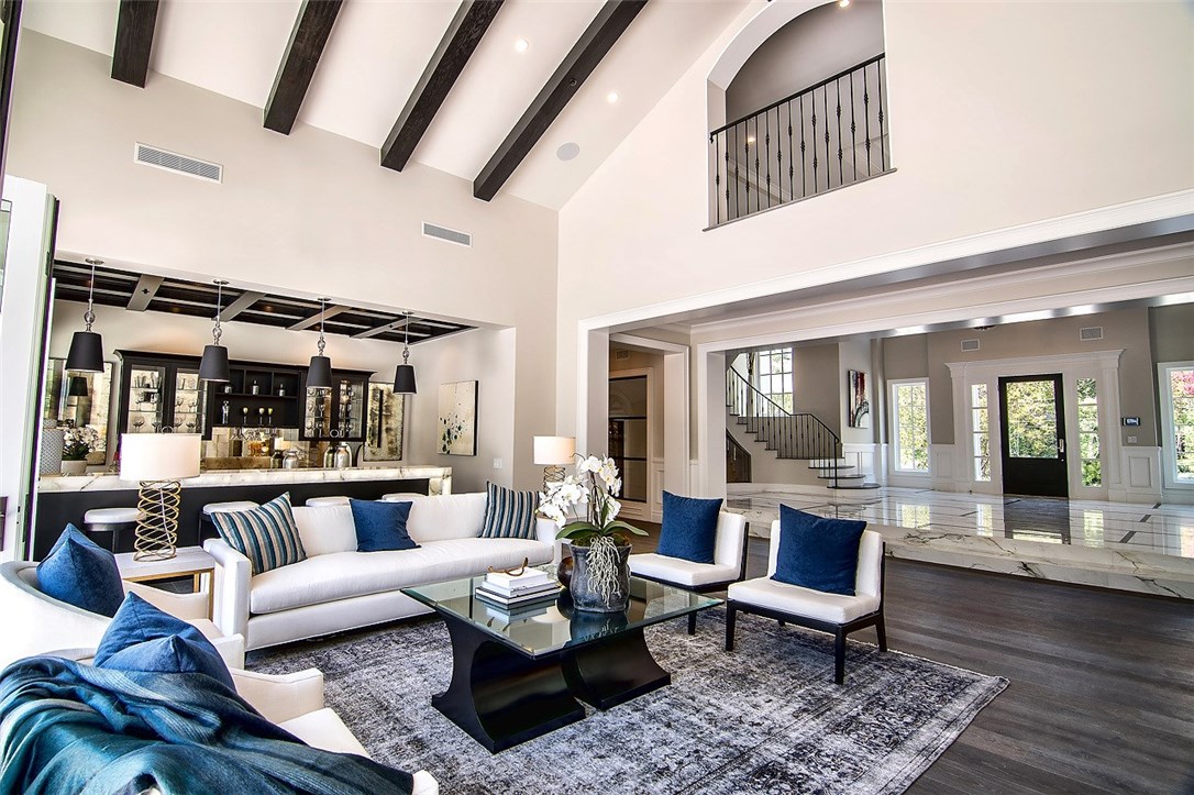 5546 Jed Smith Road Hidden Hills, CA 91302 - Photo 12 of 73 a living room with furniture and wooden floor