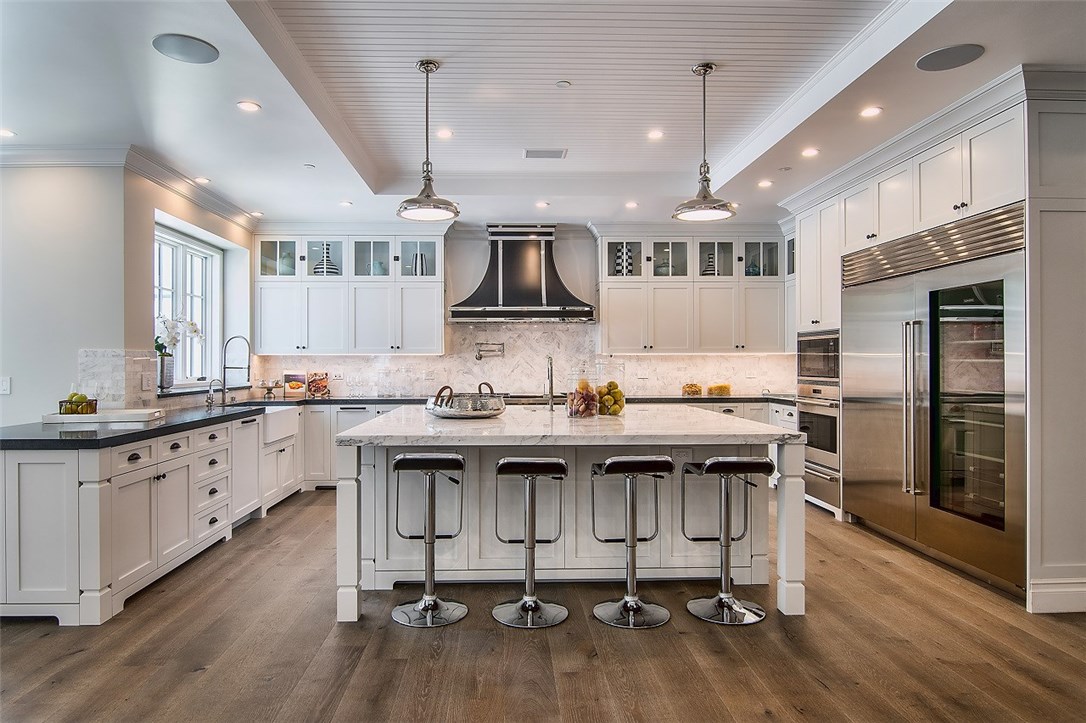 5546 Jed Smith Road Hidden Hills, CA 91302 - Photo 15 of 73 a kitchen with stainless steel appliances granite countertop a sink stove and refrigerator