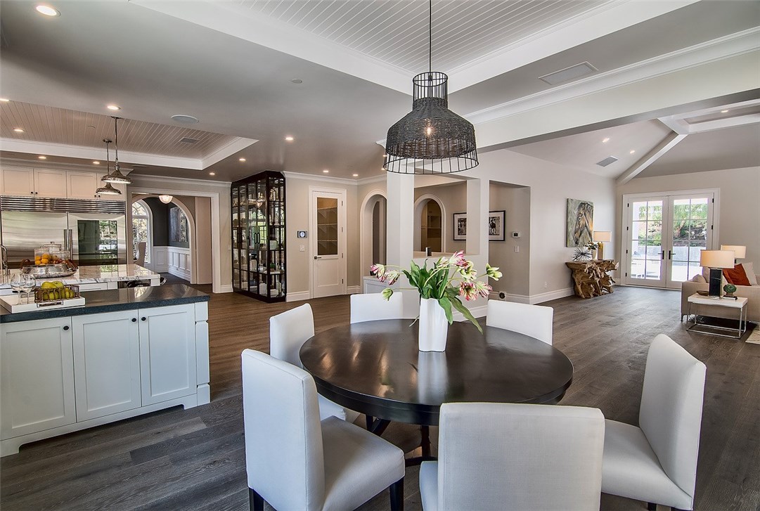 5546 Jed Smith Road Hidden Hills, CA 91302 - Photo 16 of 73 a view of a dining room with furniture wooden floor and chandelier