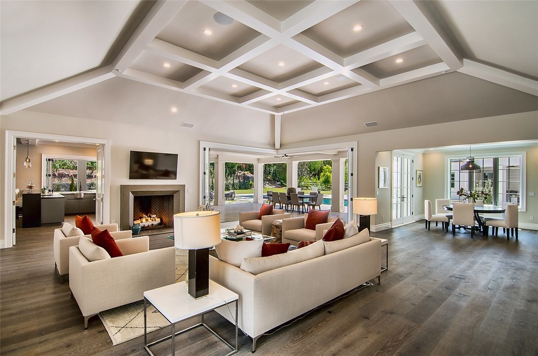 5546 Jed Smith Road Hidden Hills, CA 91302 - Photo 17 of 73 a living room with fireplace furniture and a large window