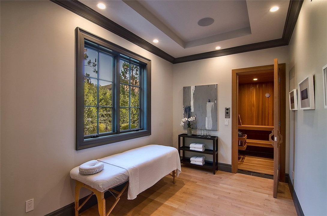 5546 Jed Smith Road Hidden Hills, CA 91302 - Photo 23 of 73 a bedroom with a bed and a chair