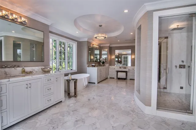 a media room with lots of chairs and a projector screen