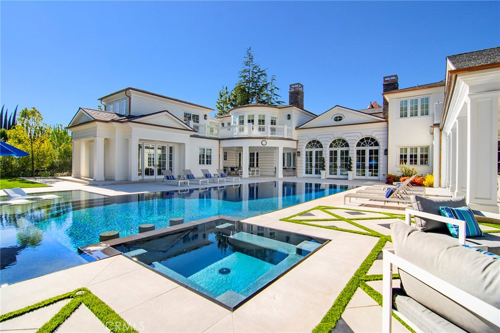 5546 Jed Smith Road Hidden Hills, CA 91302 - Photo 49 of 73 a view of a house with swimming pool and sitting area