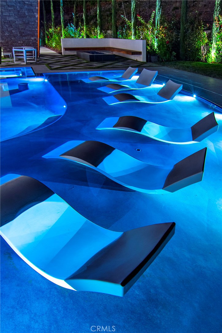 5546 Jed Smith Road Hidden Hills, CA 91302 - Photo 52 of 73 a view of swimming pool with seating space