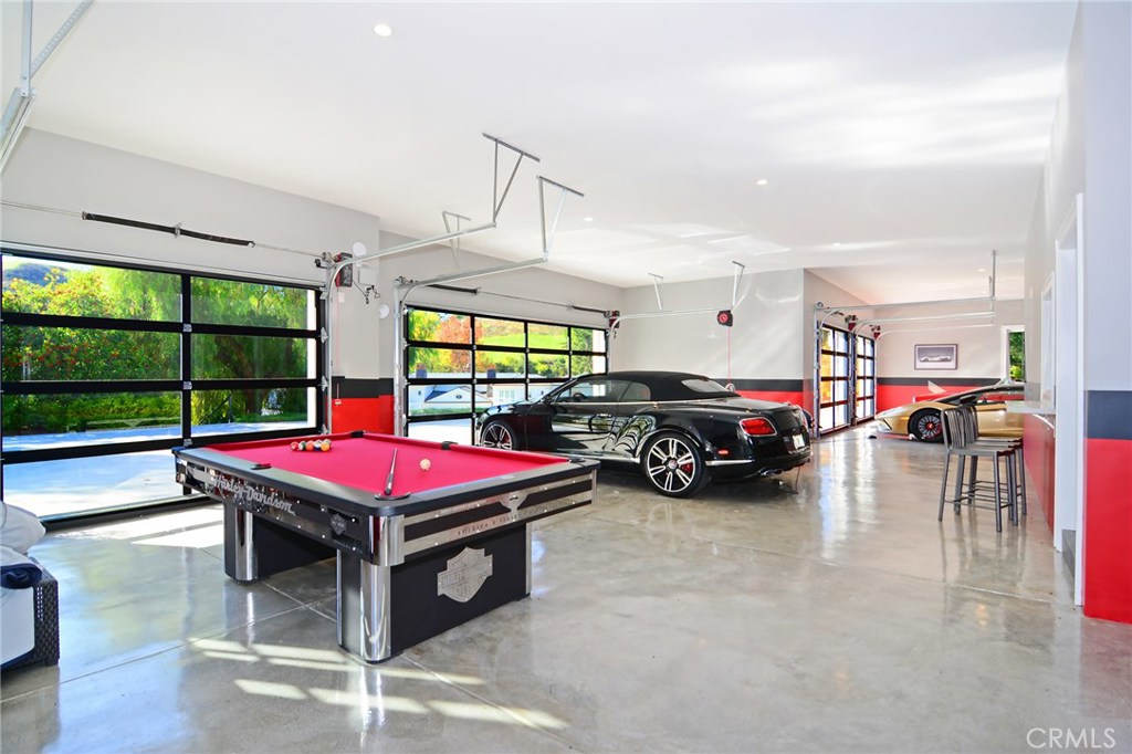5546 Jed Smith Road Hidden Hills, CA 91302 - Photo 62 of 73 a room with pool table and windows
