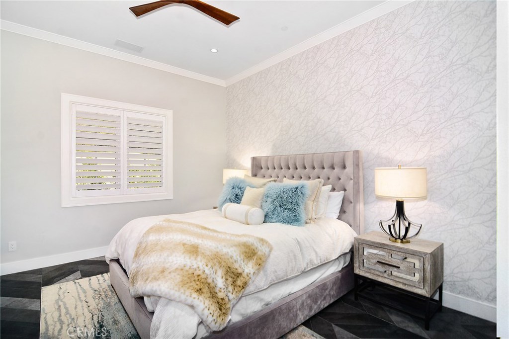 5546 Jed Smith Road Hidden Hills, CA 91302 - Photo 67 of 73 a bedroom with a bed and a night stand