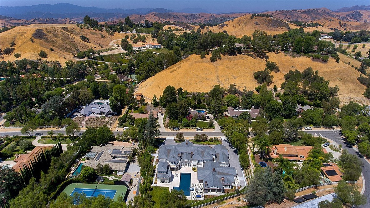 5546 Jed Smith Road Hidden Hills, CA 91302 - Photo 69 of 73 an aerial view of residential houses with outdoor space and river