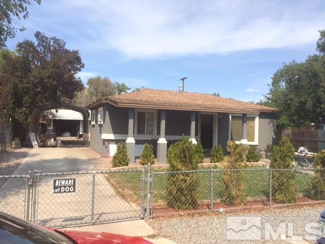 1969 Citron Street Reno, NV 89512 - Photo 1 of 1 a front view of a house with garden