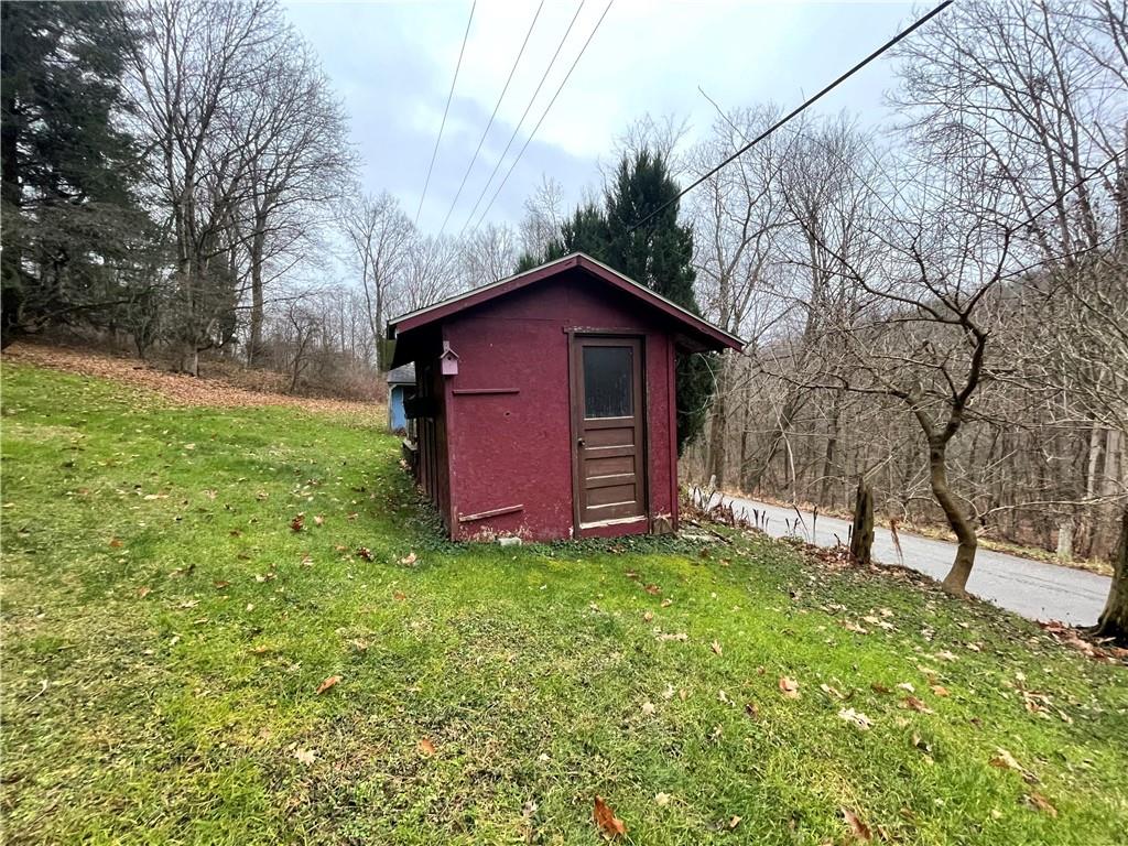 4551 Hollow Road New Castle, PA 16101 - Photo 4 of 21 a view of a house with a yard