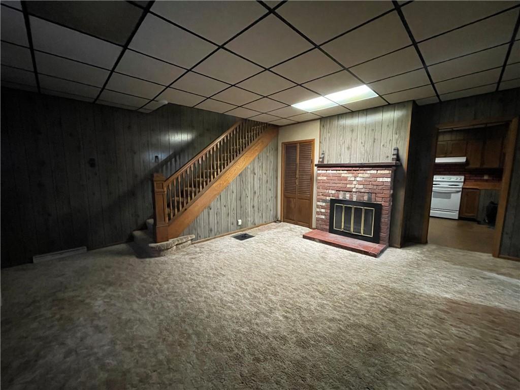 4551 Hollow Road New Castle, PA 16101 - Photo 8 of 21 a view of an empty room with a fireplace