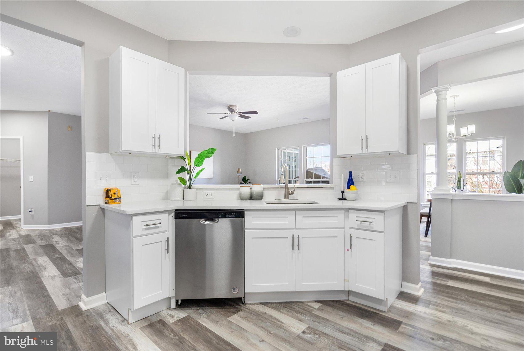 5386 Glenthorne Court, Unit 5386 Baltimore, MD 21237 - Photo 14 of 36 a kitchen with a sink cabinets and window