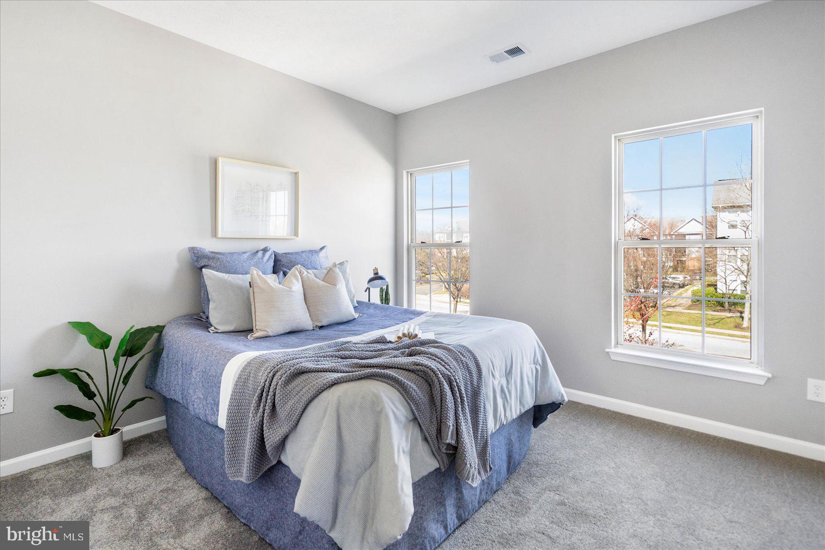 5386 Glenthorne Court, Unit 5386 Baltimore, MD 21237 - Photo 22 of 36 a bedroom with a bed and a window