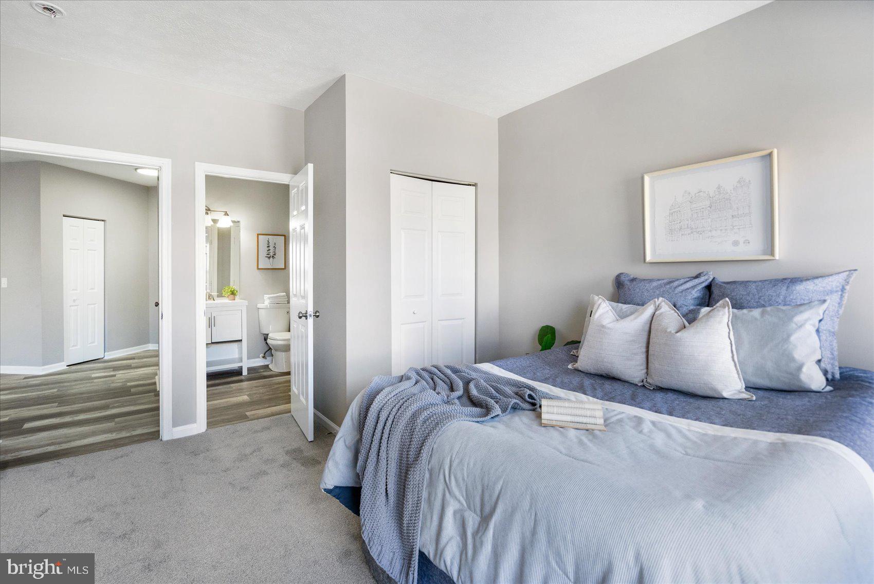 5386 Glenthorne Court, Unit 5386 Baltimore, MD 21237 - Photo 24 of 36 a bedroom with bed and a window