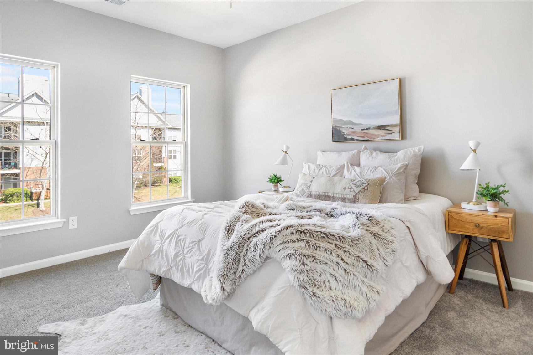 5386 Glenthorne Court, Unit 5386 Baltimore, MD 21237 - Photo 25 of 36 a bedroom with a bed and a window