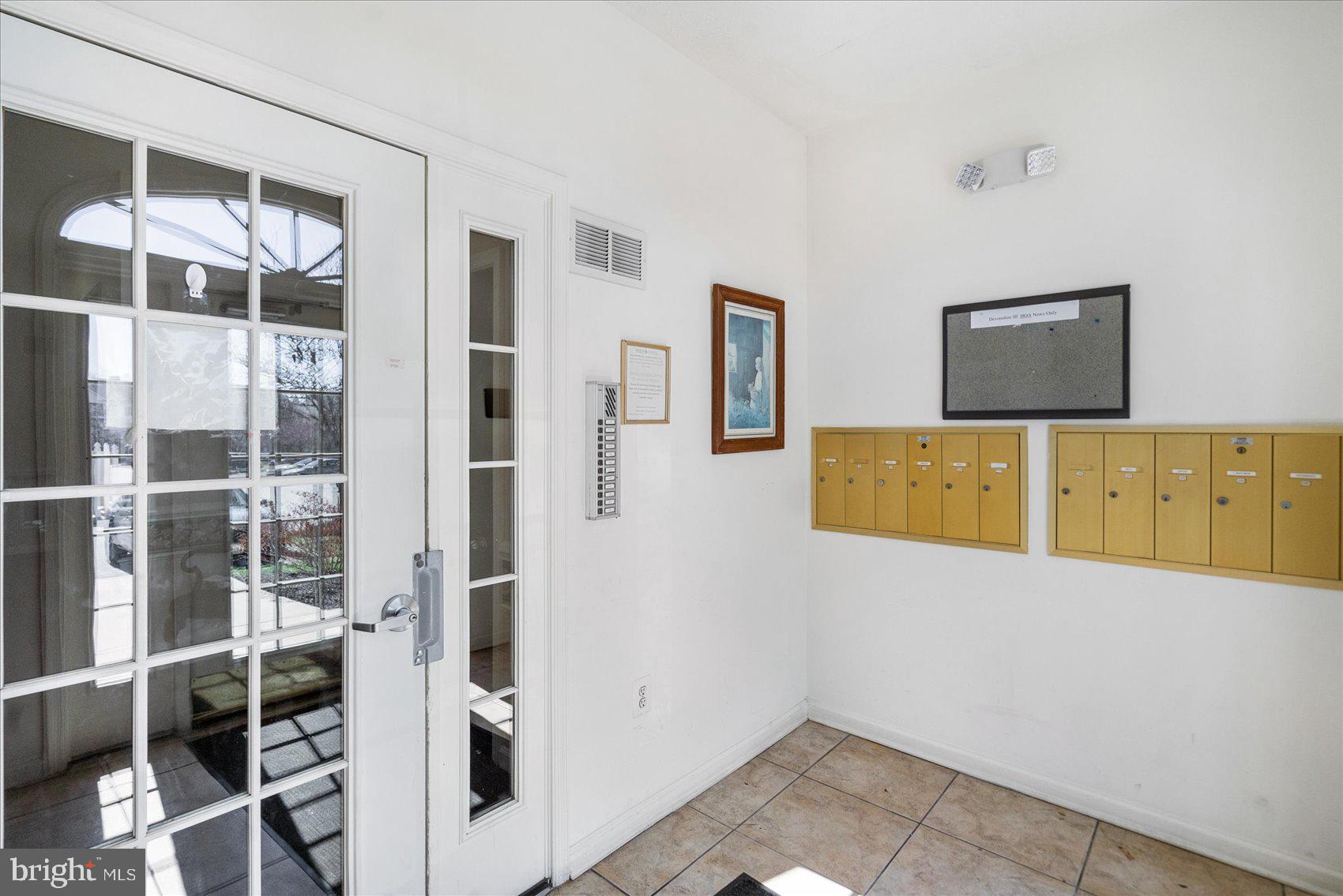 5386 Glenthorne Court, Unit 5386 Baltimore, MD 21237 - Photo 36 of 36 a view of a hallway with a elevator