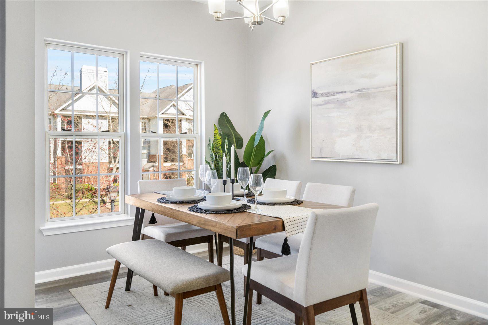 5386 Glenthorne Court, Unit 5386 Baltimore, MD 21237 - Photo 8 of 36 a view of a dining room with furniture window and outside view