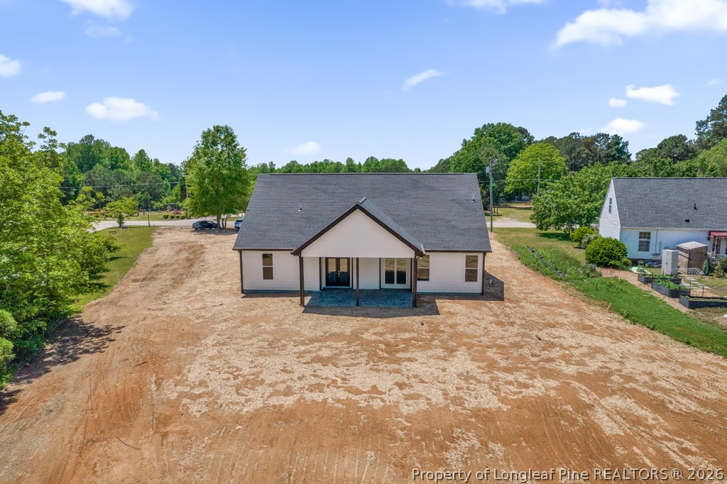 3025 Old Stage Road South Erwin, NC 28339 - Photo 45 of 50 a house with trees in the background