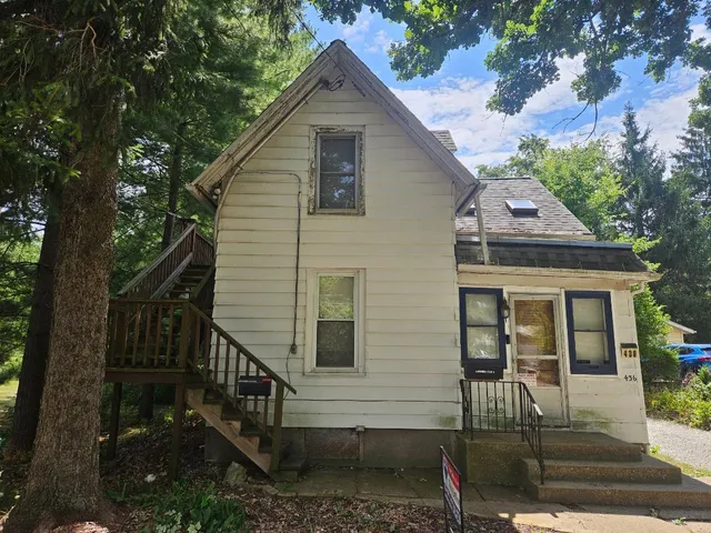 a front view of house with yard outdoor seating and yard